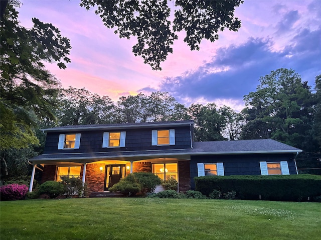 1 Concord Dr, Fort Salonga, NY 11768 - view of front of property featuring a lawn and a porch
