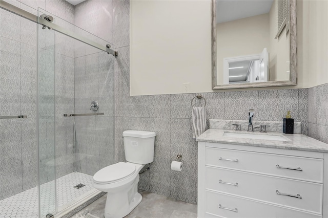 7 Wendell St, Plainview, NY 11803 - bathroom featuring toilet, vanity, a shower stall, and tile walls