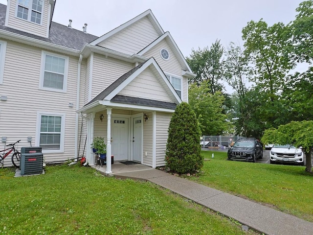 147 Ruth Ct, Middletown, NY 10940 - view of front of home featuring a front lawn, a shingled roof, and central AC unit