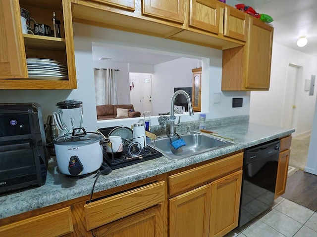 147 Ruth Ct, Middletown, NY 10940 - kitchen with dishwasher, a sink, and light tile patterned flooring