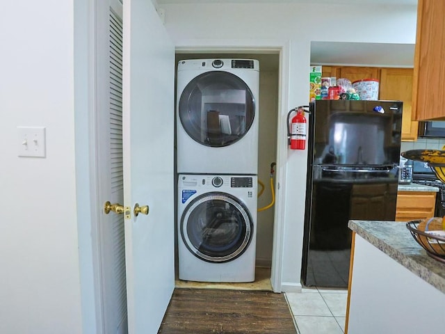 147 Ruth Ct, Middletown, NY 10940 - laundry room featuring stacked washer / dryer