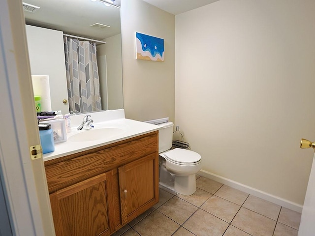 147 Ruth Ct, Middletown, NY 10940 - full bathroom featuring toilet, vanity, tile patterned flooring, a shower with shower curtain, and baseboards
