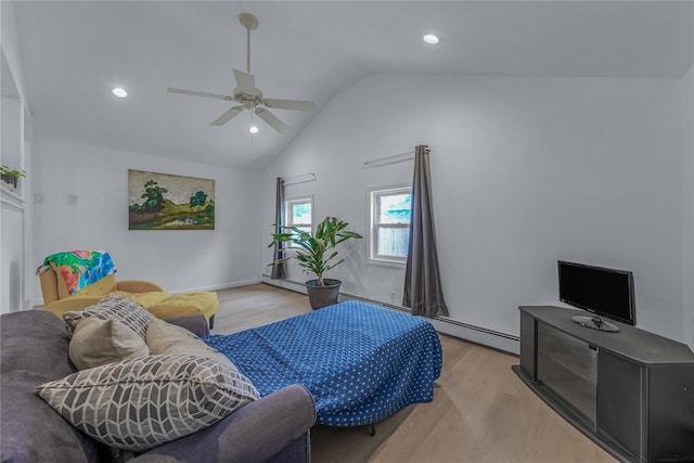 167 Front Ave, Brentwood, NY 11717 - bedroom featuring light wood-style flooring, vaulted ceiling, baseboard heating, recessed lighting, and ceiling fan