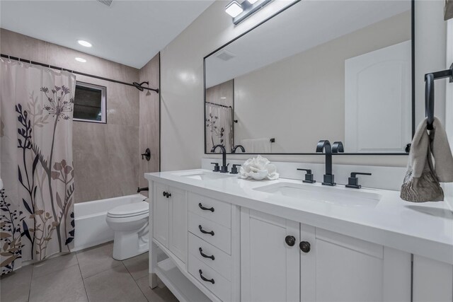 167 Front Ave, Brentwood, NY 11717 - full bathroom with double vanity, tile patterned floors, and shower / bath combo