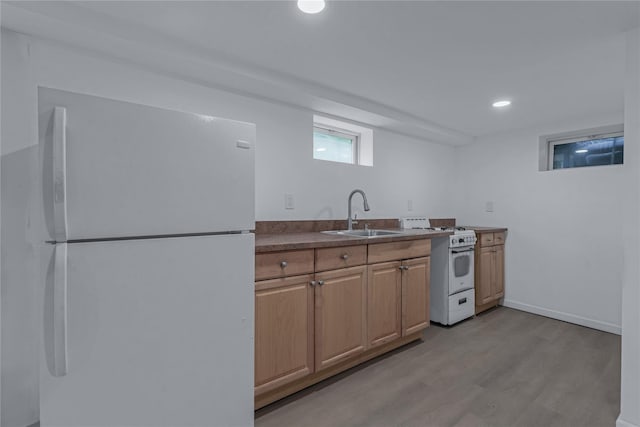 167 Front Ave, Brentwood, NY 11717 - kitchen with white appliances, light wood-type flooring, and recessed lighting