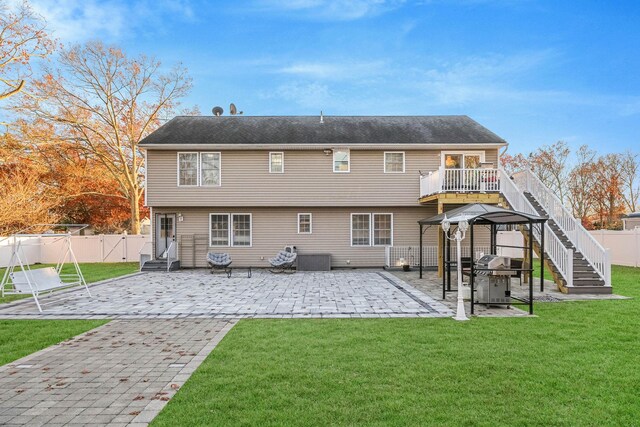 69 Plum St, Central Islip, NY 11722 - back of property with a patio