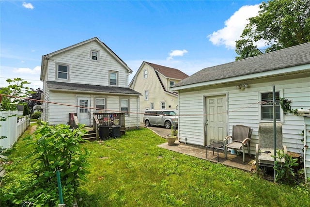 109 Leverich St, Hempstead, NY 11550 - rear view of property with a wooden deck