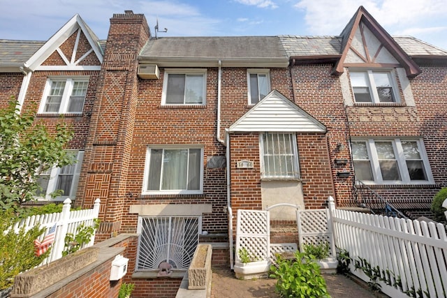 80-04 Cowles Ct, Middle Village, NY 11379 - view of front of property featuring brick siding and a chimney