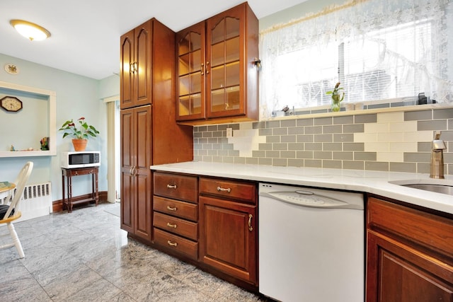 80-04 Cowles Ct, Middle Village, NY 11379 - kitchen with white appliances, decorative backsplash, light countertops, and glass insert cabinets