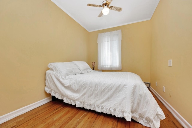 80-04 Cowles Ct, Middle Village, NY 11379 - bedroom with ornamental molding, hardwood / wood-style floors, ceiling fan, and a baseboard radiator