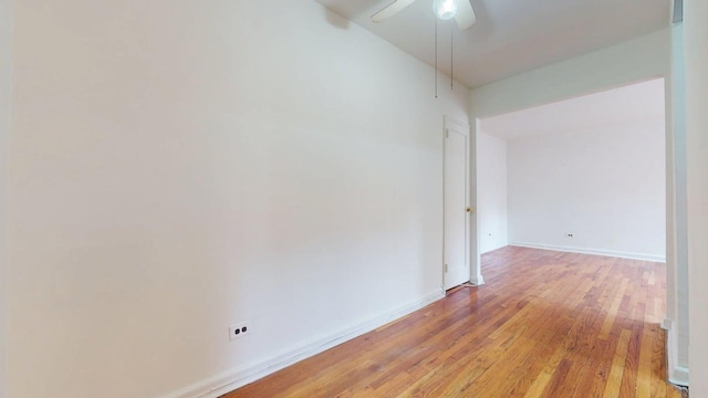 66-15 Wetherole St Unit E16, Rego Park, NY 11374 - spare room featuring light wood-type flooring, ceiling fan, and baseboards