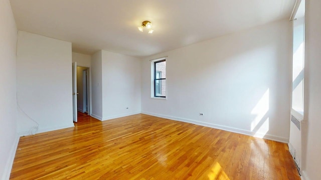 66-15 Wetherole St Unit E16, Rego Park, NY 11374 - spare room featuring light wood-type flooring and baseboards