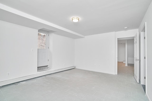 1069 Grant Ave, Bronx, NY 10456 - tiled spare room with baseboard heating, baseboards, and a smoke detector
