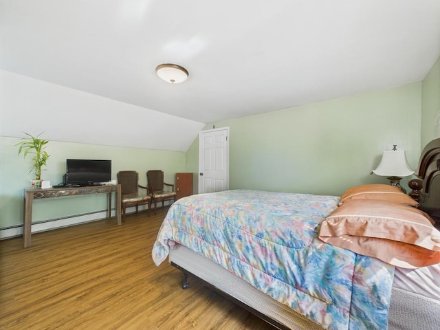 335 Loring Rd, Levittown, NY 11756 - bedroom featuring light wood finished floors and vaulted ceiling