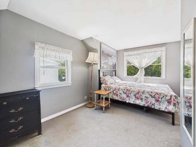 335 Loring Rd, Levittown, NY 11756 - carpeted bedroom featuring baseboards and lofted ceiling