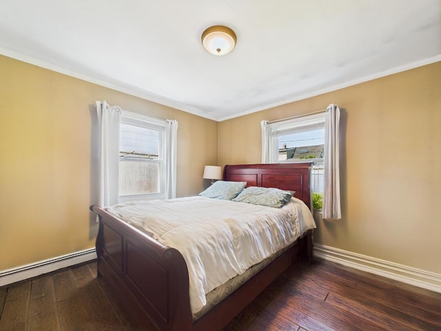 335 Loring Rd, Levittown, NY 11756 - bedroom featuring baseboard heating, hardwood / wood-style floors, and ornamental molding