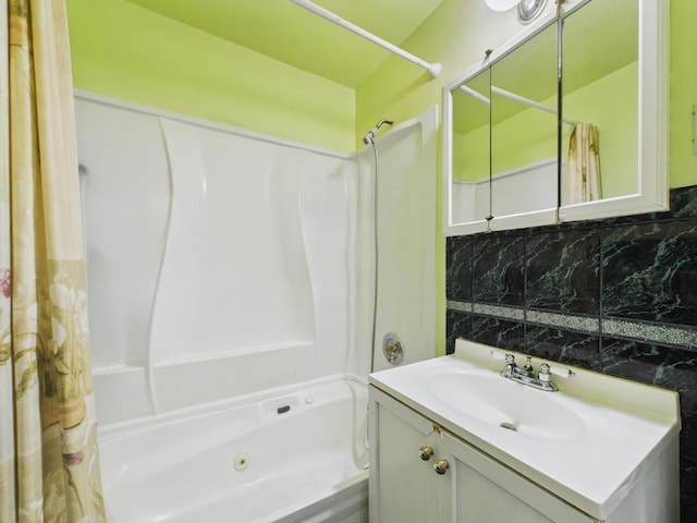 335 Loring Rd, Levittown, NY 11756 - bathroom with a combined bath / shower with jetted tub, vanity, and decorative backsplash