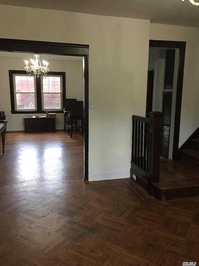 47-09 188th St, Flushing, NY 11358 - spare room with a chandelier and baseboards