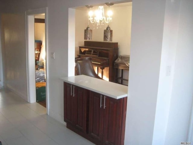 47-09 188th St, Flushing, NY 11358 - dining area with a chandelier and baseboards