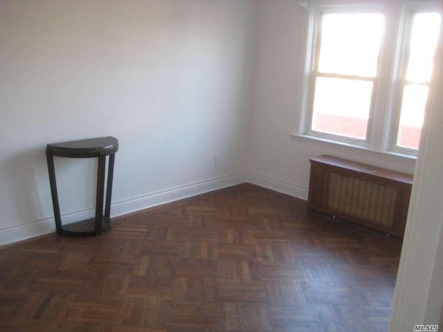 47-09 188th St, Flushing, NY 11358 - spare room featuring radiator and baseboards