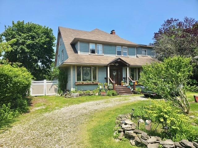 268 Windsor Ave, Brightwaters, NY 11718 - view of front of property featuring a chimney