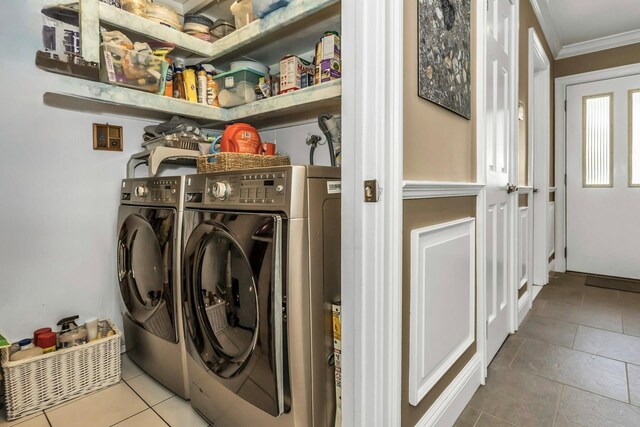 147 The Knl, Syosset, NY 11791 - laundry room featuring crown molding, washer and dryer, and tile patterned flooring
