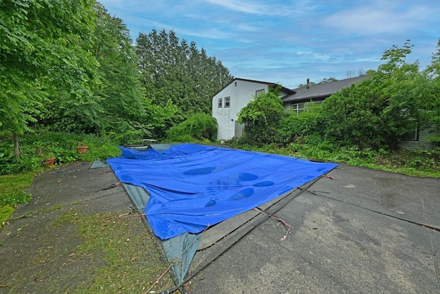8 Macintosh Ln, Monsey, NY 10952 - view of swimming pool with a covered pool, a patio area, and an outbuilding