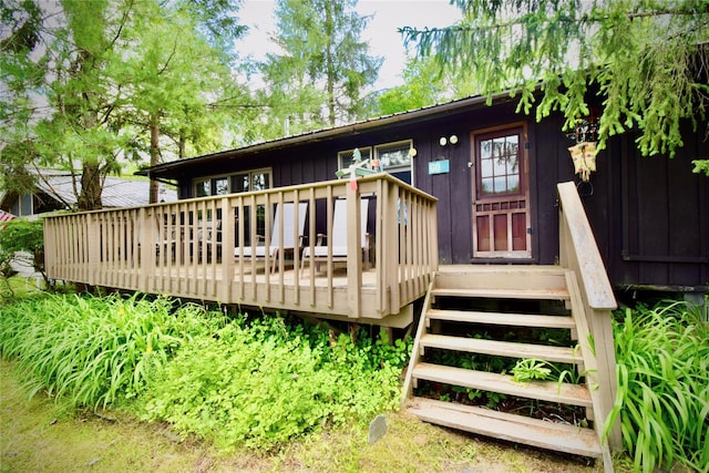 240 Trout Brook Rd, Roscoe, NY 12736 - rear view of property with a wooden deck and board and batten siding
