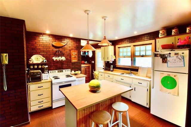 240 Trout Brook Rd, Roscoe, NY 12736 - kitchen featuring white appliances, wood counters, brick wall, white cabinets, and a kitchen island