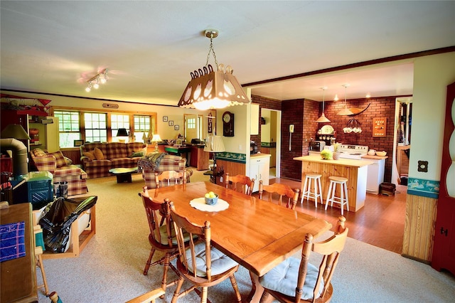 240 Trout Brook Rd, Roscoe, NY 12736 - carpeted dining room with brick wall