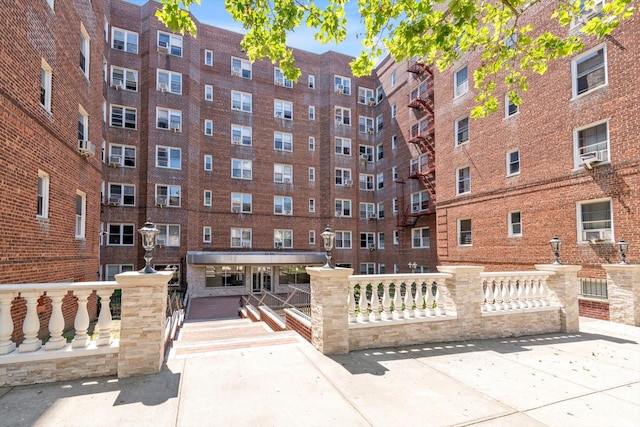 6360 102nd St Unit D8, Rego Park, NY 11374 - view of apartment building / complex featuring cooling unit