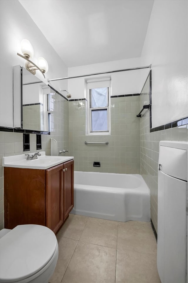 6360 102nd St Unit D8, Rego Park, NY 11374 - full bath featuring tile walls, tile patterned floors, shower / bath combination, toilet, and vanity