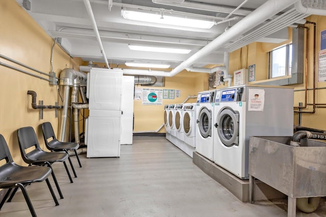 6360 102nd St Unit D8, Rego Park, NY 11374 - shared laundry room featuring washer and clothes dryer