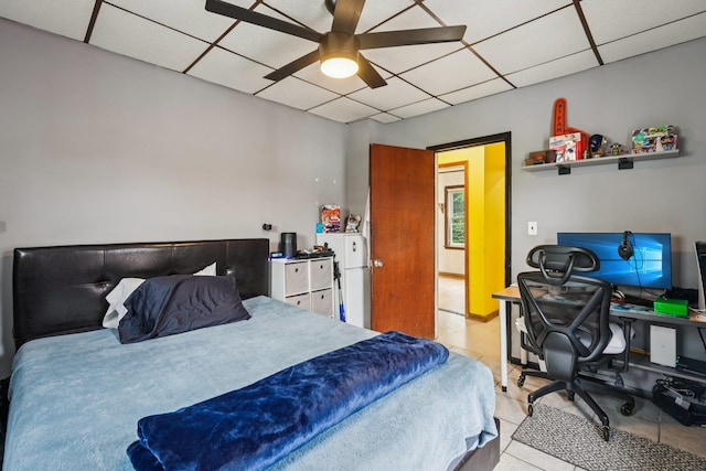 334 Union Ave, Peekskill, NY 10566 - bedroom featuring a drop ceiling, a desk, tile patterned flooring, and a ceiling fan
