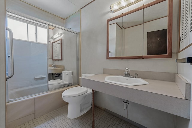 168 Gibbs Rd, Central Islip, NY 11722 - full bath featuring bath / shower combo with glass door and tile patterned flooring