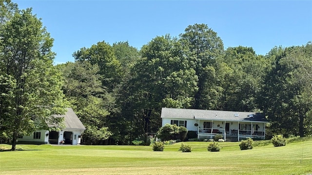 105 White Sulphur Rd, Swan Lake, NY 12783 - rear view of property featuring a lawn, a porch, and view of golf course
