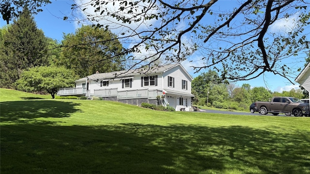 105 White Sulphur Rd, Swan Lake, NY 12783 - rear view of house featuring a lawn and a chimney