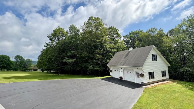 105 White Sulphur Rd, Swan Lake, NY 12783 - view of property exterior featuring a garage, a lawn, a chimney, driveway, and view of scattered trees