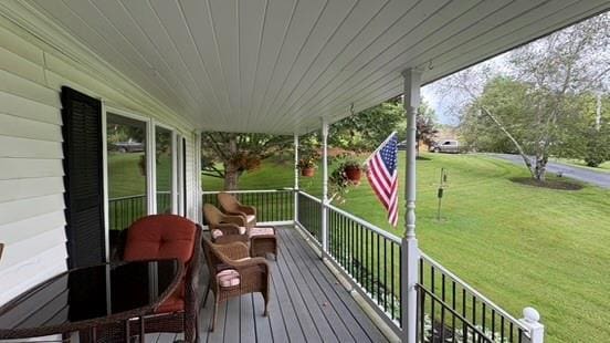 105 White Sulphur Rd, Swan Lake, NY 12783 - deck featuring a lawn