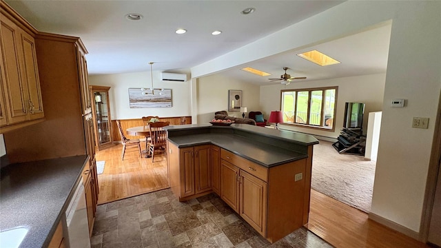 105 White Sulphur Rd, Swan Lake, NY 12783 - kitchen featuring dark countertops, open floor plan, vaulted ceiling, brown cabinetry, and recessed lighting