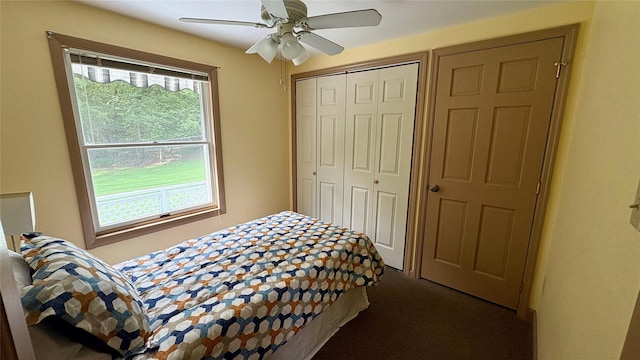 105 White Sulphur Rd, Swan Lake, NY 12783 - bedroom with a closet, ceiling fan, and dark carpet