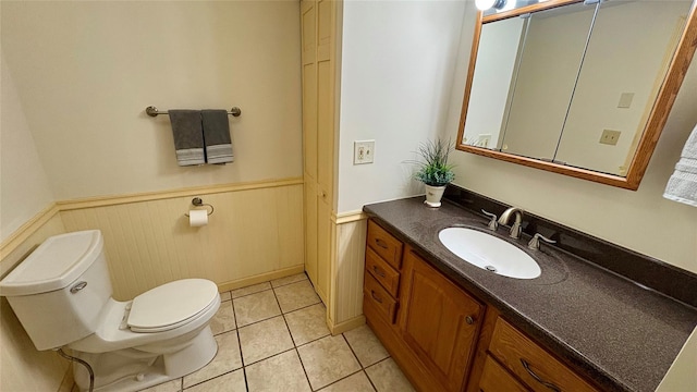 105 White Sulphur Rd, Swan Lake, NY 12783 - bathroom featuring vanity, a wainscoted wall, and tile patterned flooring