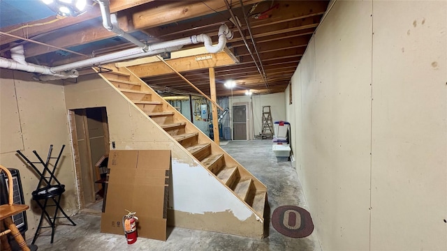 105 White Sulphur Rd, Swan Lake, NY 12783 - unfinished basement featuring stairs