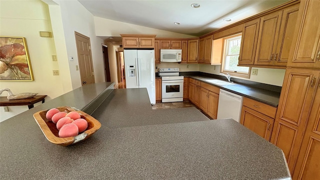 105 White Sulphur Rd, Swan Lake, NY 12783 - kitchen featuring white appliances, vaulted ceiling, dark countertops, brown cabinetry, and recessed lighting