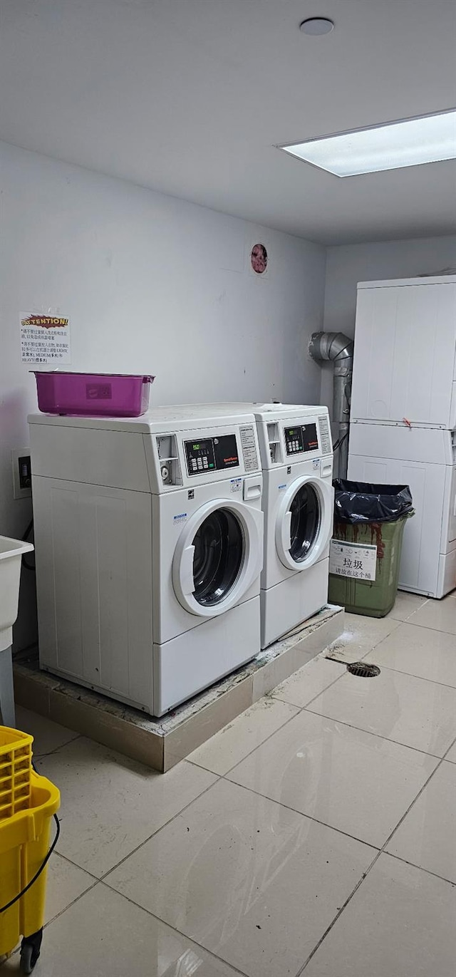 108-31 50th Ave Unit 1, Corona, NY 11368 - community laundry room featuring washer and clothes dryer