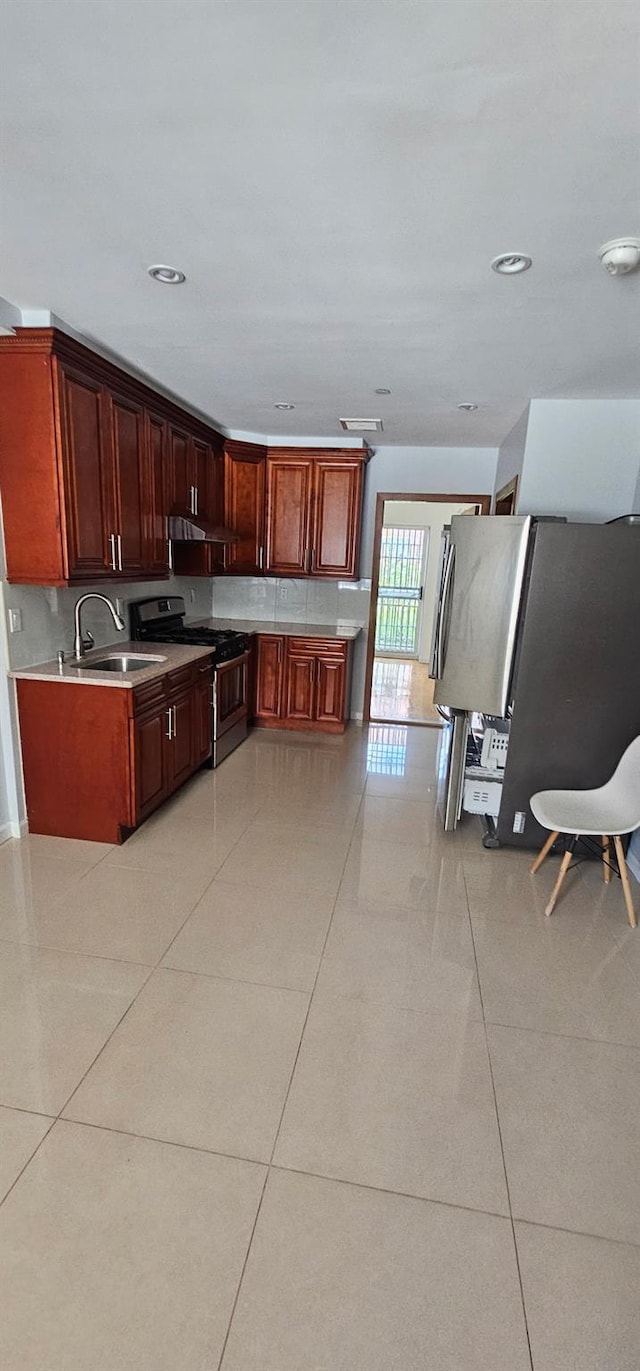 108-31 50th Ave Unit 1, Corona, NY 11368 - kitchen with stainless steel gas range, a sink, light tile patterned floors, and recessed lighting