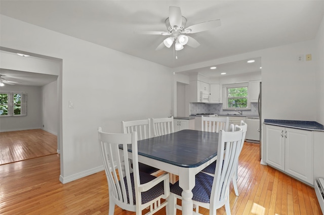 4 Leewood Cir Unit 3R, Eastchester, NY 10709 - dining space with a ceiling fan, light wood-style floors, baseboard heating, and recessed lighting