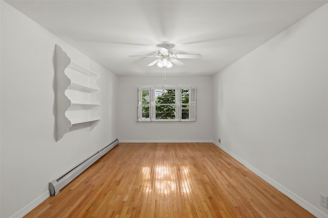 4 Leewood Cir Unit 3R, Eastchester, NY 10709 - unfurnished room with a baseboard heating unit, a ceiling fan, and light wood-type flooring
