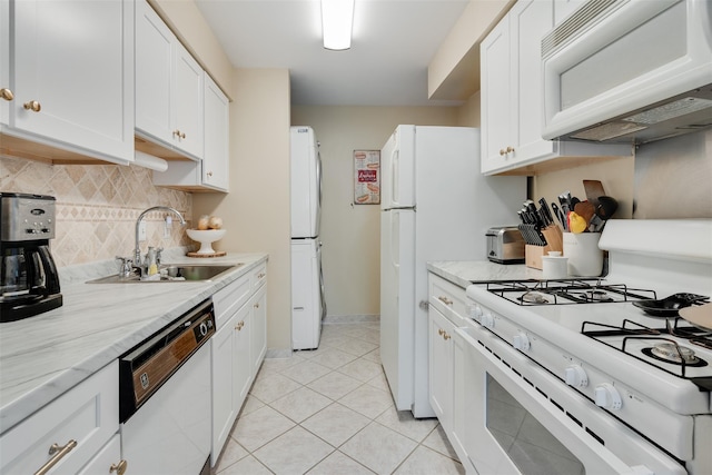 3305 Pine Cone Ct, Poughkeepsie, NY 12603 - kitchen with white appliances, tasteful backsplash, white cabinets, and stacked washer / drying machine
