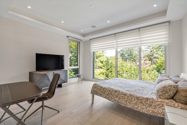 1555 Stevenson Rd, Hewlett, NY 11557 - bedroom featuring a raised ceiling, wood finished floors, and recessed lighting